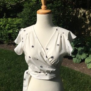 E M Flutter Sleeve Wrap Top